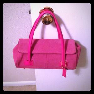 Suede hot pink purse with matching wallet.