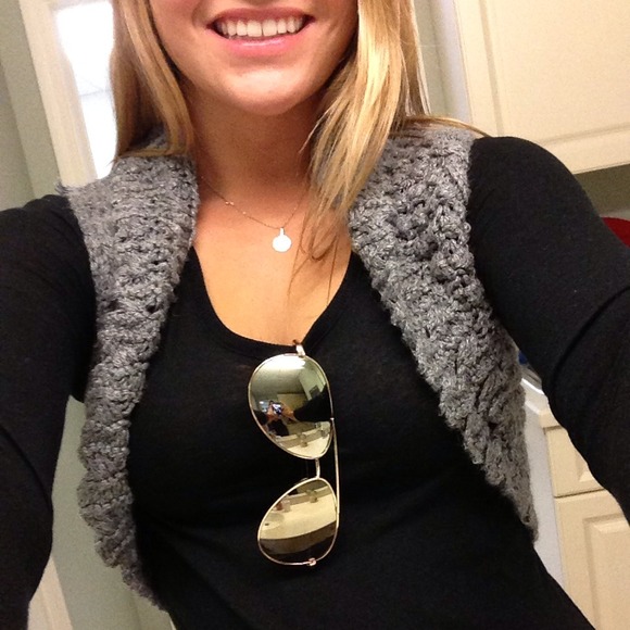 Grey sleeveless cardigan
