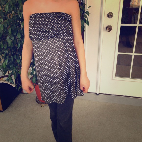 Shimmery black strapless top with white polka dots
