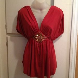 Burnt orange blouse with gold studs