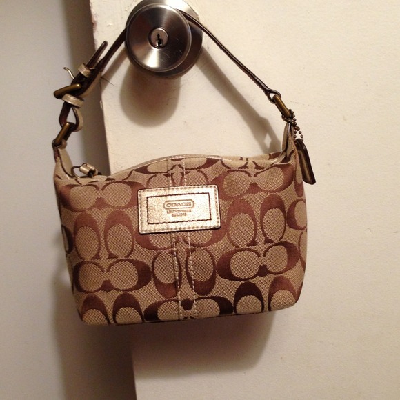 Hold New coach small bag
