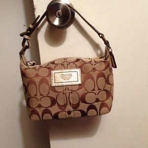 Hold New coach small bag