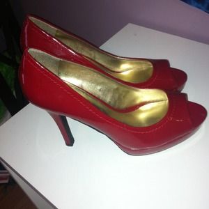 Red open toe pumps