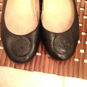 Black leather ballet flats