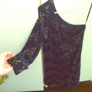 One sleeve form fitting dress.