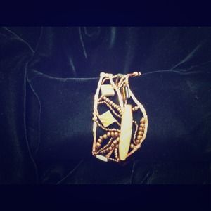 Hand beaded and crafted stone wrist cuff