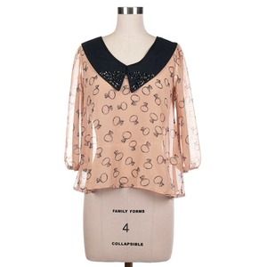 Ring printed and stud on collar chiffon top.