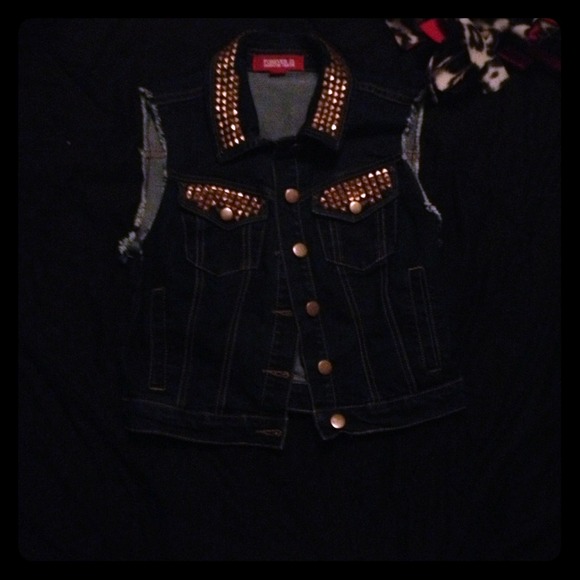 Cute, and fun cut off studded vest!