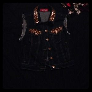 Cute, and fun cut off studded vest!