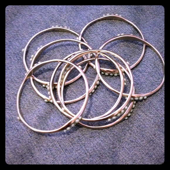 "BUNDLED*****Silver bangles with light blue studs