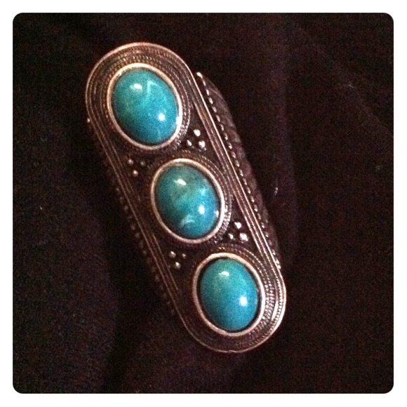Long teal ring