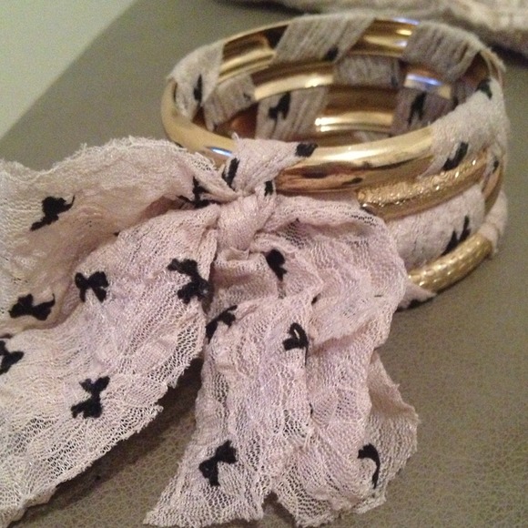 Four bracelets wrapped around a nice ribbon!!