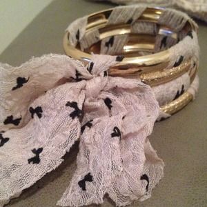 Four bracelets wrapped around a nice ribbon!!