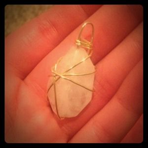 Rose quartz pendant with gold wrapping