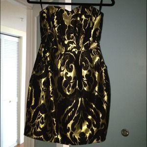Black and gold statement making dress!