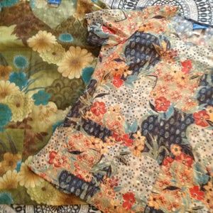 Two floral scrub tops bundled with other tops