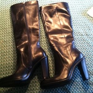 Black leather boots , never worn