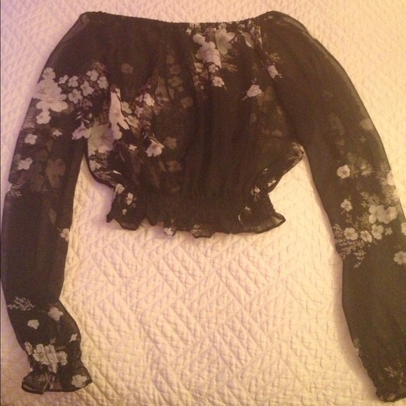Cute see through shirt. Black & White flowers.