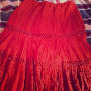 A-line swinging skirt, rust color w/ embroidery