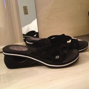 Black Sketcher sandal with white strip