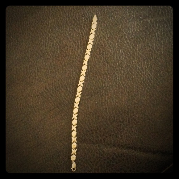 10k XO bracelet.     Sold in bundle