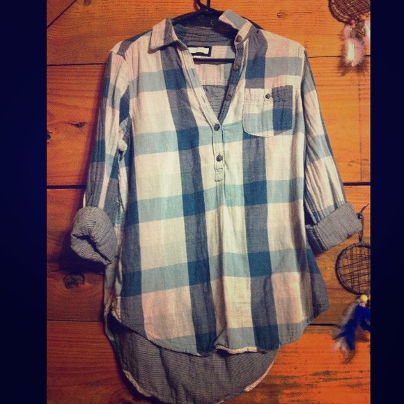 Long plaid shirt pullover style. Used but stylish!