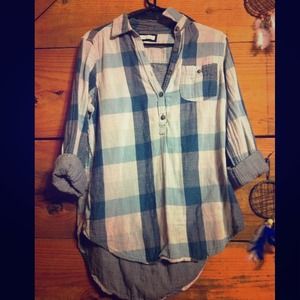Long plaid shirt pullover style. Used but stylish!