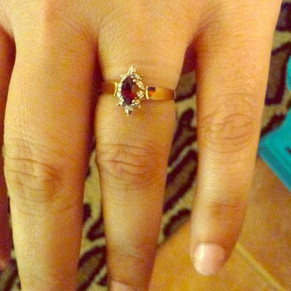 10k Garnet with small diamonds.