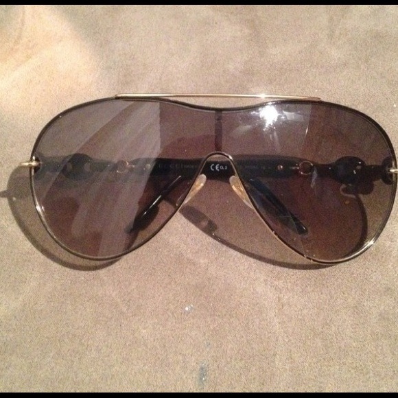 Gucci gold and black sunglasses main image 3