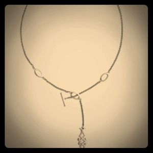 The Scrolled Ichthus Lariat Necklace is 18" long.