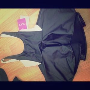 ❌SOLD❌Peplum pleather high-low top.