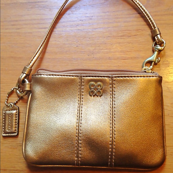 Bundle gold and black wristlet coach with tags
