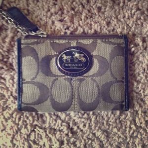 RESERVED. Coach brown coin purse