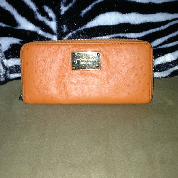 Authentic Michael Kors orange leather wallet