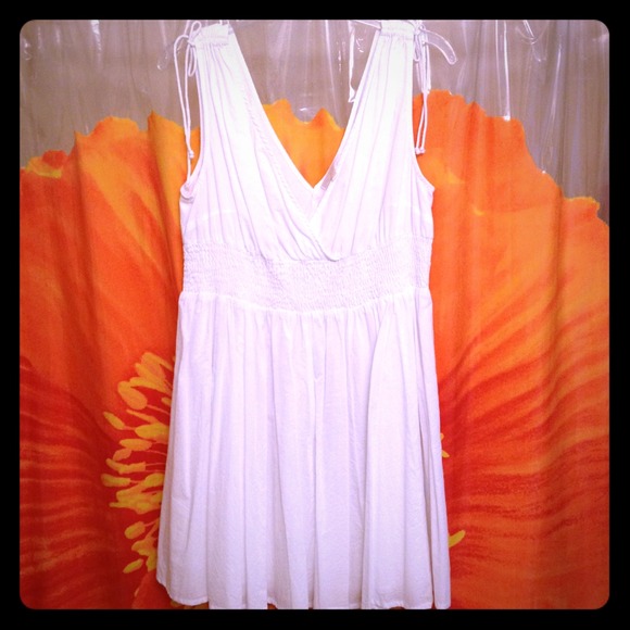 White cross-front V-neck dress with shoulder ties