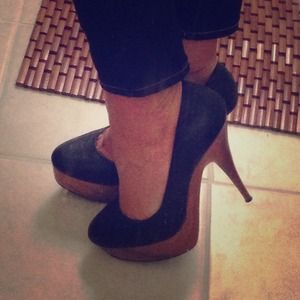 Black stilettos with wood platforms