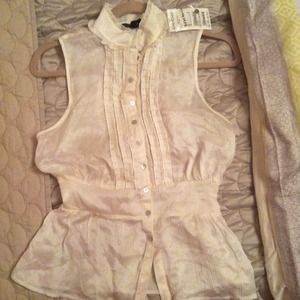 Silk cream colored BEBE ruffle blouse
