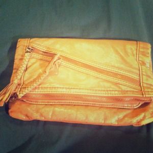 Converse tan leather wallet.