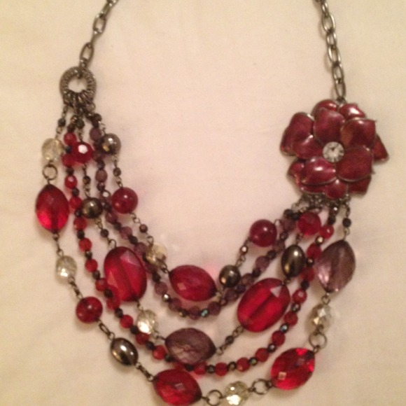 Silver and red necklace with flower detail