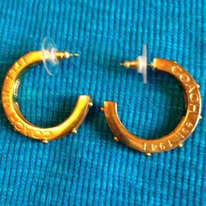 Coach hoop earrings.