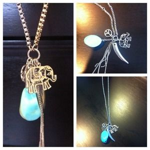 Silver charm necklace with turquoise accent