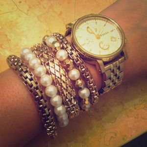 Stack of 5 rose gold bracelets