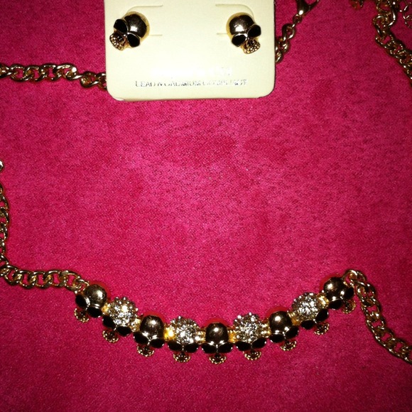 Rhinestone skull necklace and earrings