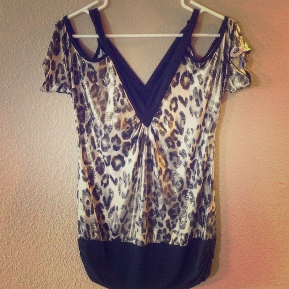 Unique! Exotic leopard-patterned shimmery shirt.