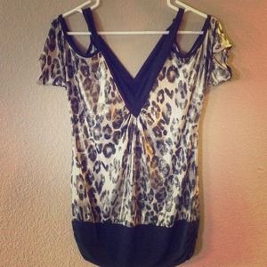 Unique! Exotic leopard-patterned shimmery shirt.