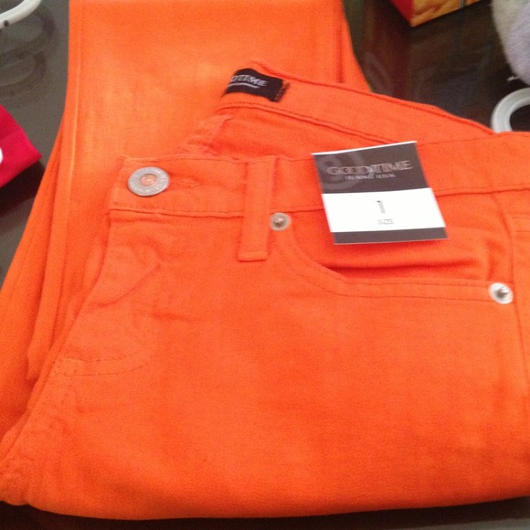 Bright orange skinny jeans
