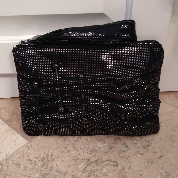 Black and shiny copper clutch.