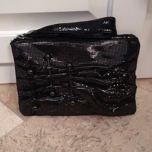 Black and shiny copper clutch.