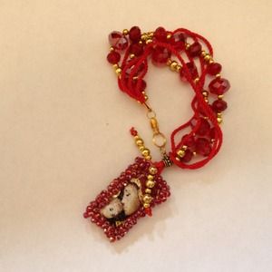 Scapular red with bracelet