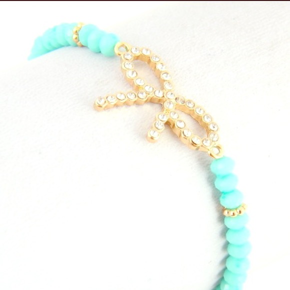 💢Reserved💢Teal and Gold Bow bracelet